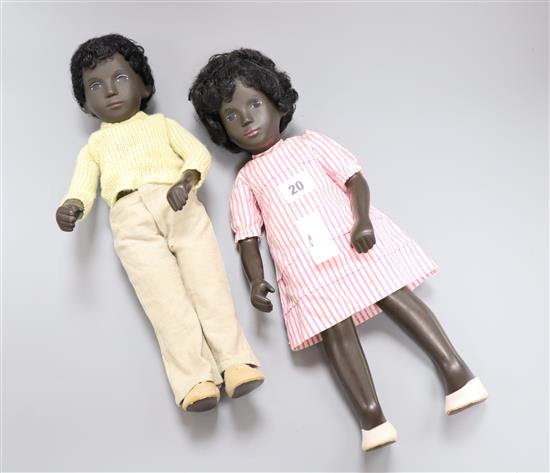 Two black vintage Sasha dolls, boy and girl, excellent condition